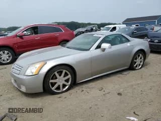 ✅ 2004 Cadillac XLR • VIN: 1G6YV34A245603827 • Lot: 67064475. Wystawiony na Copart z przebiegiem Nie podano. Bezpłatny archiwum sprzedaży aukcyjnych z USA i szczegółowy raport historii pojazdu na DreamBid. Zdjęcie 1.