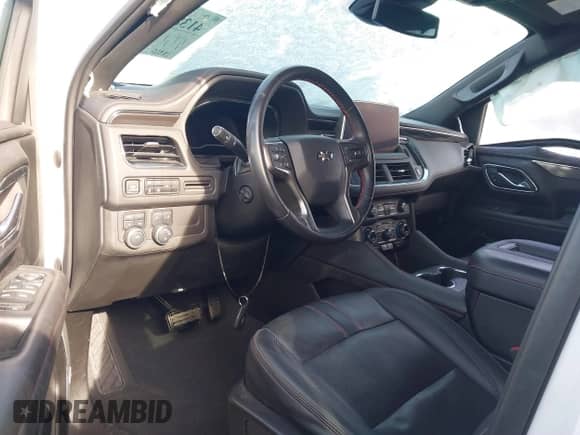2023 Chevrolet Tahoe RST with VIN 1GNSKRKL5PR124079, listed as a IAAI auction lot 41389636 with 18,920 mi miles and . Bid and sale history available at DreamBid. Image 5.