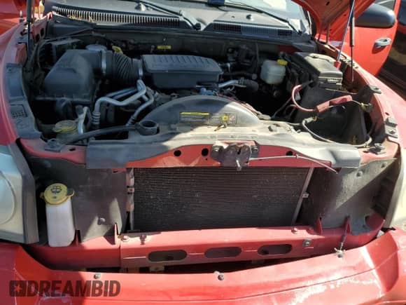 2006 Dodge Dakota SLT с VIN 1D7HE48N76S634016, выставлен на аукционе Copart как лот 54238774 с пробегом 233 035 миль миль и Списание • Salvage title. История ставок и продаж доступна на DreamBid. Изображение 11.