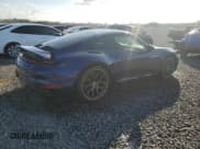 ✅ 2021 Porsche 911 Carrera • VIN: WP0AA2A97MS206873 • Lot: 77359214. Listed on Copart with 1,036 mi. Free auction sales archive from the USA and detailed vehicle history report at DreamBid. Image 3.