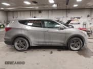 ✅ 2017 Hyundai Santa Fe 2.4L • VIN: 5NMZTDLB9HH000738 • Lot: 43829716. Listed on IAAI with 154,400 mi. Free auction sales archive from the USA and detailed vehicle history report at DreamBid. Image 13.