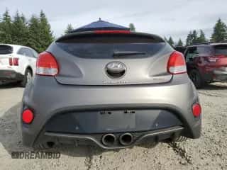 2015 Hyundai Veloster Turbo z VIN KMHTC6AEXFU237769, wystawiony jako Copart lot #84004975 z przebiegiem 98 923 mil mil oraz Czysty tytuł • Clean title. Historia ofert i sprzedaży dostępna na DreamBid. Obrazek 6.