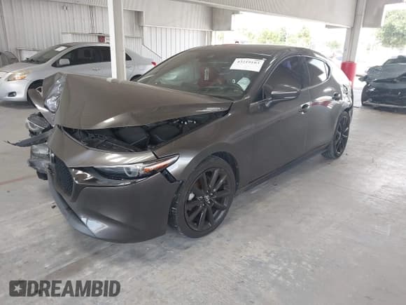 ✅ 2021 Mazda 3 Premium • VIN: JM1BPAML3M1310609 • Лот: 43219103. Опубликован ранее на IAAI с пробегом 56 157 миль. Бесплатный доступ к архиву аукционных продаж из США и подробный отчёт об истории автомобиля на DreamBid. Изображение 17.