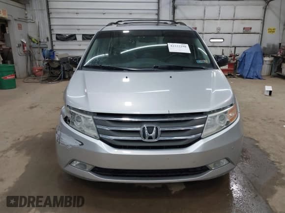 ✅ 2012 Honda Odyssey Touring • VIN: 5FNRL5H99CB052361 • Lot: 42332298. Listed on IAAI with 185,914 mi. Free auction sales archive from the USA and detailed vehicle history report at DreamBid. Image 12.