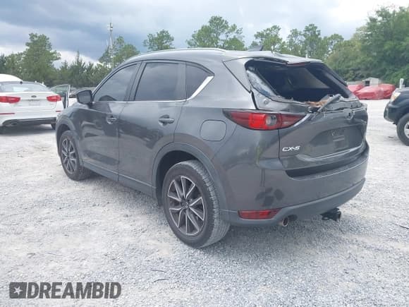 ✅ 2018 Mazda CX-5 Touring • VIN: JM3KFACM1J1407050 • Lot: 42430879. Wystawiony na IAAI z przebiegiem 68 362 mil. Bezpłatny archiwum sprzedaży aukcyjnych z USA i szczegółowy raport historii pojazdu na DreamBid. Zdjęcie 3.