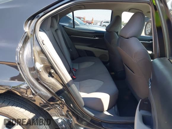 ✅ 2021 Toyota Camry LE • VIN: 4T1C11AKXMU409214 • Lot: 42987667. Listed on IAAI with 83,115 mi. Free auction sales archive from the USA and detailed vehicle history report at DreamBid. Image 8.