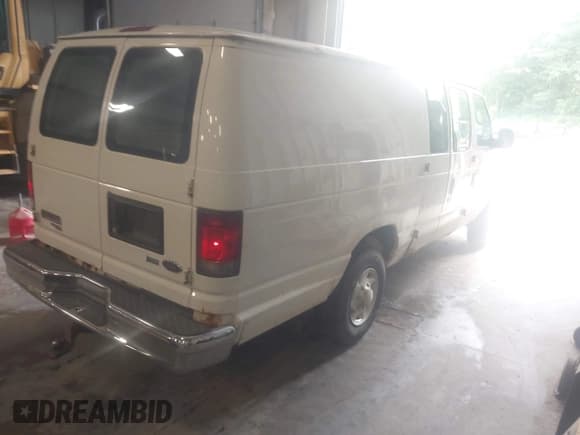 ✅ 2011 Ford Econoline Cargo Commercial • VIN: 1FTSS3ELXBDA58054 • Lot: 42641162. Listed on IAAI with 103,413 mi. Free auction sales archive from the USA and detailed vehicle history report at DreamBid. Image 4.