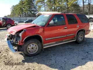1999 Chevrolet Blazer LS with VIN 1GNDT13W6XK227357, listed as a Copart auction lot 46644235 with 228,532 mi miles and Salvage title. Bid and sale history available at DreamBid. Image 1.