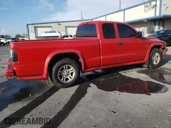 2004 Dodge Dakota Sport z VIN 1D7GL32K64S607803, wystawiony jako Copart lot #59599475 z przebiegiem 283 644 mil mil oraz Szkoda całkowita • Salvage title. Historia ofert i sprzedaży dostępna na DreamBid. Obrazek 3.