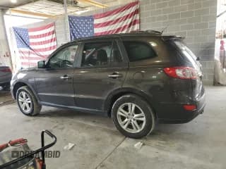 ✅ 2011 Hyundai Santa Fe Limited • VIN: 5XYZK4AG4BG090674 • Lot: 79179594. Listed on Copart with 158,226 mi. Free auction sales archive from the USA and detailed vehicle history report at DreamBid. Image 2.
