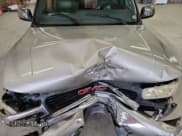 ✅ 1999 GMC Sierra 1500 SLE • VIN: 1GTEK19T7XZ520785 • Лот: 67946695. Опубликован ранее на Copart с пробегом 306 015 миль. Бесплатный доступ к архиву аукционных продаж из США и подробный отчёт об истории автомобиля на DreamBid. Изображение 11.