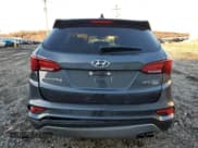 ✅ 2017 Hyundai Santa Fe Ultimate • VIN: 5XYZWDLA7HG483753 • Лот: 40912203. Опубликован ранее на Copart с пробегом 74 356 миль. Бесплатный доступ к архиву аукционных продаж из США и подробный отчёт об истории автомобиля на DreamBid. Изображение 6.