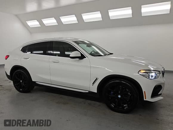 ✅ 2020 BMW X4 xDrive30i • VIN: 5UX2V1C04L9B65174 • Лот: 67093975. Опубликован ранее на Copart с пробегом 94 262 миль. Бесплатный доступ к архиву аукционных продаж из США и подробный отчёт об истории автомобиля на DreamBid. Изображение 4.