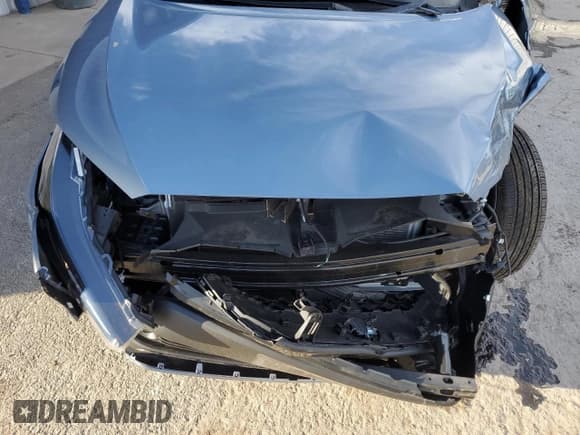 ✅ 2022 Toyota Corolla Cross L • VIN: 7MUAAABG9NV034823 • Lot: 89881115. Listed on Copart with 21,466 mi. Free auction sales archive from the USA and detailed vehicle history report at DreamBid. Image 12.