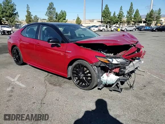 2021 Toyota Camry Hybrid XSE с VIN 4T1K31AK6MU022259, выставлен на аукционе Copart как лот 70696655 с пробегом 155 767 миль миль и Списание • Salvage title. История ставок и продаж доступна на DreamBid. Изображение 14.