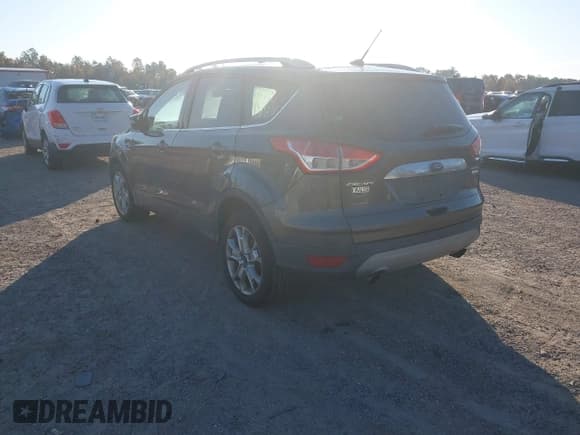 ✅ 2016 Ford Escape Titanium • VIN: 1FMCU0JX8GUB20446 • Lot: 43740057. Wystawiony na IAAI z przebiegiem 101 781 mil. Bezpłatny archiwum sprzedaży aukcyjnych z USA i szczegółowy raport historii pojazdu na DreamBid. Zdjęcie 3.