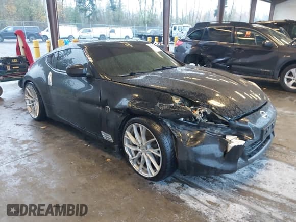 ✅ 2011 Nissan 370Z Touring • VIN: JN1AZ4EH4BM553135 • Lot: 43703048. Listed on IAAI with 99,998 mi. Free auction sales archive from the USA and detailed vehicle history report at DreamBid. Image 1.