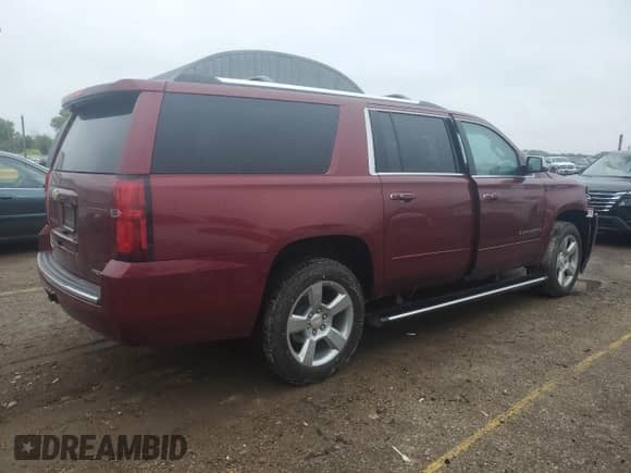 2019 Chevrolet Suburban Premier z VIN 1GNSKJKC8KR326232, wystawiony jako Copart lot #70490135 z przebiegiem Nie podano mil oraz Szkoda całkowita • Salvage title. Historia ofert i sprzedaży dostępna na DreamBid. Obrazek 3.