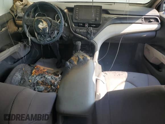 2023 Toyota Camry LE с VIN 4T1C11BK0PU083345, выставлен на аукционе Copart как лот 65721765 с пробегом Не указан миль и Списание • Salvage title. История ставок и продаж доступна на DreamBid. Изображение 8.