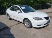 ✅ 2005 Mazda 3 i • VIN: JM1BK12F551281126 • Lot: 43010180. Listed on IAAI with 194,642 mi. Free auction sales archive from the USA and detailed vehicle history report at DreamBid. Image 1.