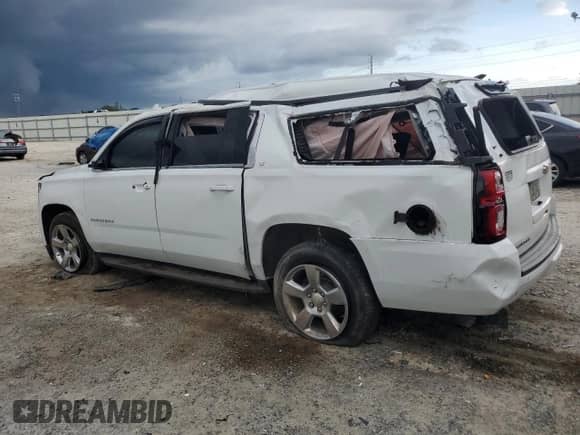 2017 Chevrolet Suburban LT z VIN 1GNSCHKC2HR299687, wystawiony jako Copart lot #64944284 z przebiegiem Nie podano mil oraz Szkoda całkowita • Salvage title. Historia ofert i sprzedaży dostępna na DreamBid. Obrazek 2.