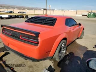 ✅ 2022 Dodge Challenger R/T Scat Pack Widebody • VIN: 2C3CDZFJ4NH164655 • Lot: 69957202. Wystawiony na Copart z przebiegiem 3 704 mil. Bezpłatny archiwum sprzedaży aukcyjnych z USA i szczegółowy raport historii pojazdu na DreamBid. Zdjęcie 3.