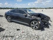 ✅ 2021 Volkswagen Arteon SE • VIN: WVWAR7AN2ME008297 • Lot: 66904005. Listed on Copart with 55,578 mi. Free auction sales archive from the USA and detailed vehicle history report at DreamBid. Image 4.