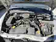 2002 Dodge Dakota SLT z VIN 1B7HL48X02S545545, wystawiony jako Copart lot #77478754 z przebiegiem 83 985 mil mil oraz Czysty tytuł • Clean title. Historia ofert i sprzedaży dostępna na DreamBid. Obrazek 11.