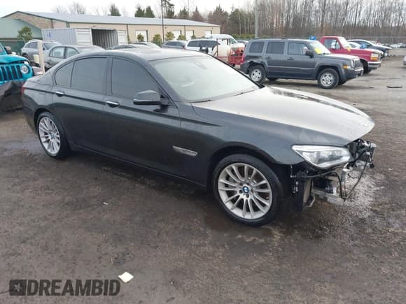 ✅ 2015 BMW 7 Series 750i xDrive • VIN: WBAYB6C56FG299238 • Lot: 41441393. Listed on IAAI with 62,396 mi. Free auction sales archive from the USA and detailed vehicle history report at DreamBid. Image 1.