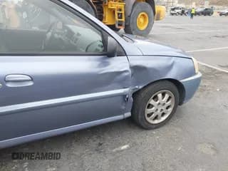 ✅ 2003 Kia Rio • VIN: KNADC125736236506 • Lot: 41467649. Listed on IAAI with 109,975 mi. Free auction sales archive from the USA and detailed vehicle history report at DreamBid. Image 6.