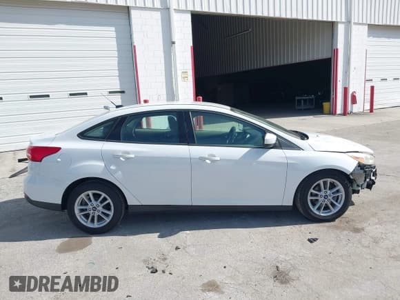 ✅ 2018 Ford Focus SE • VIN: 1FADP3F21JL225220 • Лот: 43670473. Опубликован ранее на IAAI с пробегом 125 394 миль. Бесплатный доступ к архиву аукционных продаж из США и подробный отчёт об истории автомобиля на DreamBid. Изображение 14.