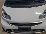 ✅ 2013 Smart fortwo Passion • VIN: WMEEJ9AA6DK717318 • Lot: 68388855. Listed on Copart with Not provided. Free auction sales archive from the USA and detailed vehicle history report at DreamBid. Image 11.