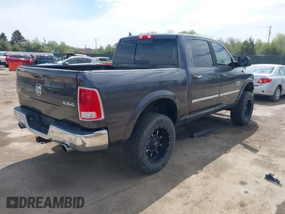 ✅ 2015 Ram 1500 Laramie • VIN: 1C6RR7NM7FS615604 • Lot: 42203601. Listed on IAAI with 161,441 mi. Free auction sales archive from the USA and detailed vehicle history report at DreamBid. Image 4.