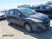 ✅ 2012 Mazda 5 Sport • VIN: JM1CW2BL8C0110989 • Lot: 42070091. Listed on IAAI with 320,397 mi. Free auction sales archive from the USA and detailed vehicle history report at DreamBid. Image 1.