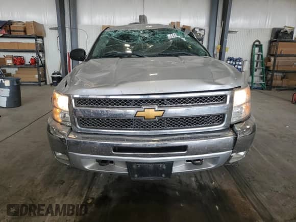 2013 Chevrolet Silverado 1500 LT с VIN 1GCRKSE74DZ262964, выставлен на аукционе Copart как лот 71714145 с пробегом 126 231 миль миль и Списание • Salvage title. История ставок и продаж доступна на DreamBid. Изображение 5.