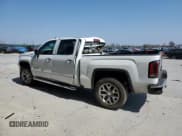 ✅ 2018 GMC Sierra 1500 SLT • VIN: 3GTU2NEC7JG313412 • Лот: 49053805. Опубликован ранее на Copart с пробегом 148 302 миль. Бесплатный доступ к архиву аукционных продаж из США и подробный отчёт об истории автомобиля на DreamBid. Изображение 2.