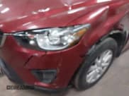 ✅ 2013 Mazda CX-5 Sport • VIN: JM3KE4BE7D0164630 • Lot: 41965600. Listed on IAAI with 157,879 mi. Free auction sales archive from the USA and detailed vehicle history report at DreamBid. Image 19.