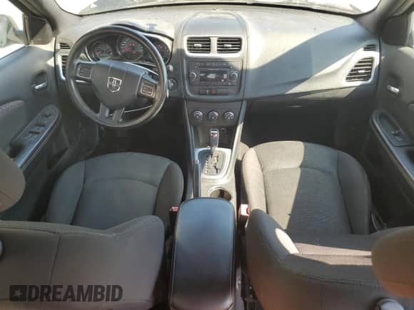 2014 Dodge Avenger SE with VIN 1C3CDZAB3EN168672, listed as a Copart auction lot 68719285 with 128,915 mi miles and Salvage title. Bid and sale history available at DreamBid. Image 8.