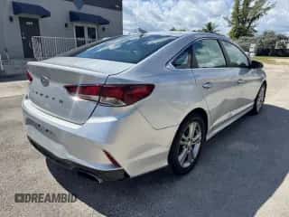 2018 Hyundai Sonata SEL с VIN 5NPE34AF6JH599143, выставлен на аукционе Copart как лот 90253585 с пробегом 111 516 миль миль и Списание • Salvage title. История ставок и продаж доступна на DreamBid. Изображение 3.