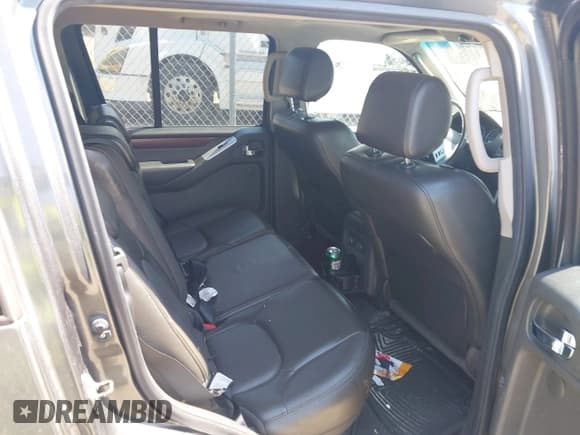 ✅ 2009 Nissan Pathfinder SE • VIN: 5N1AR18B39C615574 • Lot: 42802230. Listed on IAAI with 119,025 mi. Free auction sales archive from the USA and detailed vehicle history report at DreamBid. Image 8.