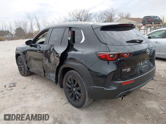 ✅ 2025 Mazda CX-50 S Premium • VIN: 7MMVABDM7SN334320 • Lot: 43597828. Listed on IAAI with 11,321 mi. Free auction sales archive from the USA and detailed vehicle history report at DreamBid. Image 3.