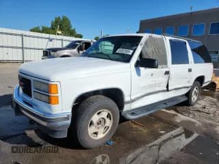 ✅ 1999 GMC Suburban • VIN: 3GKFK16R6XG549955 • Lot: 69302585. Listed on Copart with 204,949 mi. Free auction sales archive from the USA and detailed vehicle history report at DreamBid. Image 1.