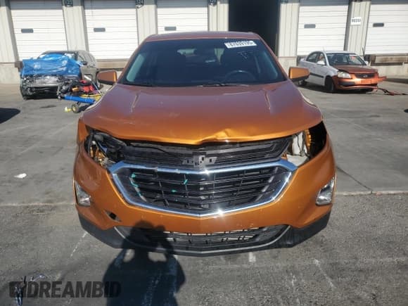 ✅ 2018 Chevrolet Equinox LT • VIN: 2GNAXJEV3J6159170 • Lot: 87039195. Wystawiony na Copart z przebiegiem 88 287 mil. Bezpłatny archiwum sprzedaży aukcyjnych z USA i szczegółowy raport historii pojazdu na DreamBid. Zdjęcie 5.