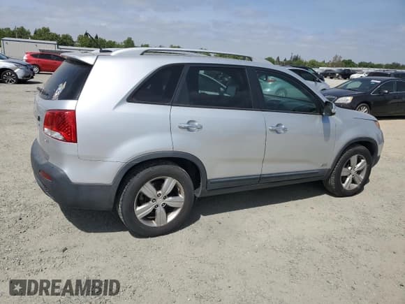 ✅ 2013 Kia Sorento EX • VIN: 5XYKUDA23DG411929 • Lot: 54327335. Listed on Copart with 141,926 mi. Free auction sales archive from the USA and detailed vehicle history report at DreamBid. Image 3.