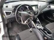 ✅ 2016 Hyundai Veloster • VIN: KMHTC6AD0GU251706 • Lot: 84030844. Wystawiony na Copart z przebiegiem 83 251 mil. Bezpłatny archiwum sprzedaży aukcyjnych z USA i szczegółowy raport historii pojazdu na DreamBid. Zdjęcie 8.