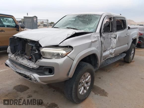 ✅ 2017 Toyota Tacoma SR5 • VIN: 5TFCZ5AN9HX048433 • Lot: 42464852. Listed on IAAI with 112,464 mi. Free auction sales archive from the USA and detailed vehicle history report at DreamBid. Image 2.
