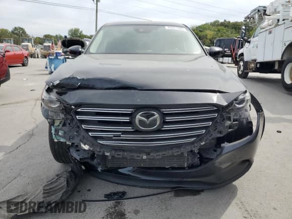 ✅ 2019 Mazda CX-9 Touring • VIN: JM3TCACY8K0302187 • Lot: 70201395. Listed on Copart with 142,477 mi. Free auction sales archive from the USA and detailed vehicle history report at DreamBid. Image 5.