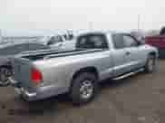 2002 Dodge Dakota SLT с VIN 1B7GL42N42S504550, выставлен на аукционе IAAI как лот 41552476 с пробегом 162 325 миль миль и . История ставок и продаж доступна на DreamBid. Изображение 4.