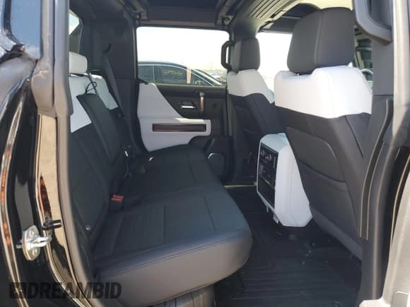 ✅ 2025 GMC HUMMER EV Pickup 2X • VIN: 1GT40BDD9SU112026 • Lot: 64216005. Wystawiony na Copart z przebiegiem 818 mil. Bezpłatny archiwum sprzedaży aukcyjnych z USA i szczegółowy raport historii pojazdu na DreamBid. Zdjęcie 10.