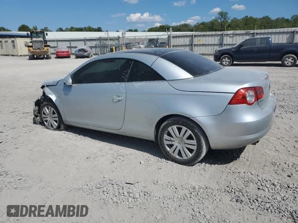 ✅ 2008 Volkswagen Eos Turbo • VIN: WVWBA71F48V041392 • Лот: 69295394. Опубликован ранее на Copart с пробегом 127 873 миль. Бесплатный доступ к архиву аукционных продаж из США и подробный отчёт об истории автомобиля на DreamBid. Изображение 2.